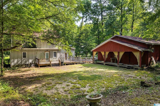 view of yard with a wooden deck