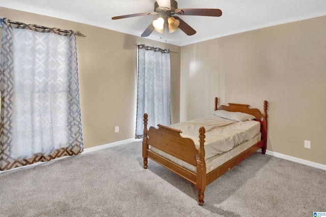 bedroom with ceiling fan, light colored carpet, and ornamental molding