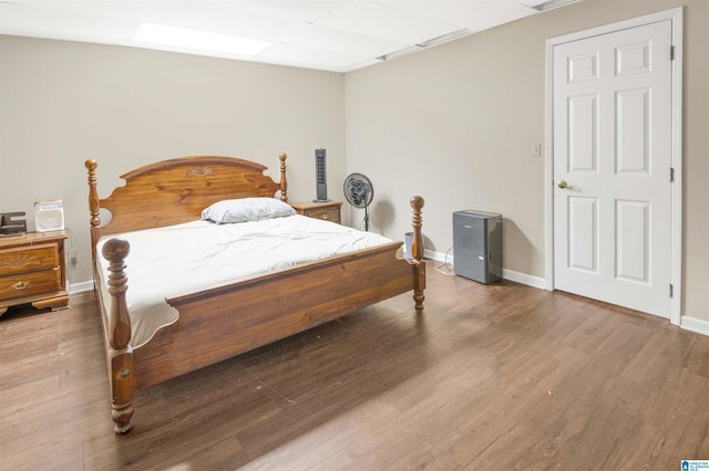 bedroom featuring hardwood / wood-style floors