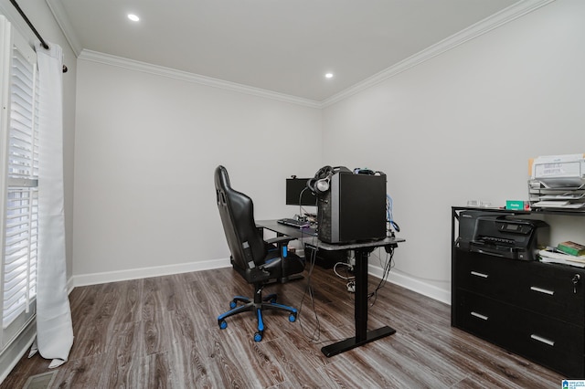 office space featuring wood-type flooring and crown molding