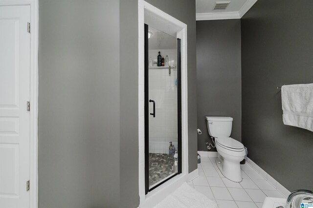 bathroom with walk in shower, tile patterned flooring, crown molding, and toilet