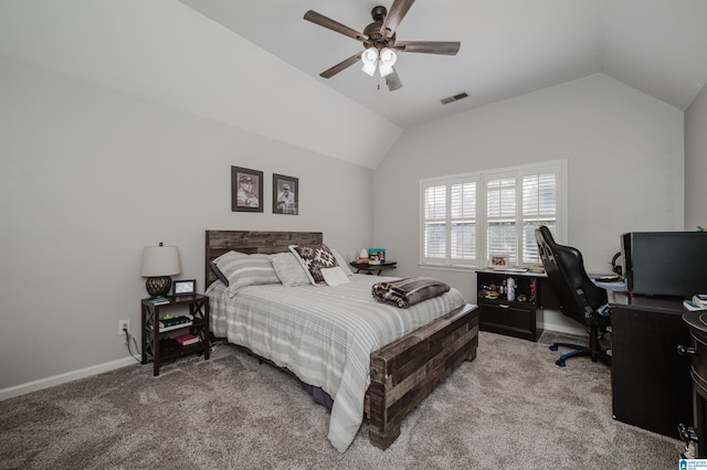 bedroom featuring light carpet, ceiling fan, and vaulted ceiling