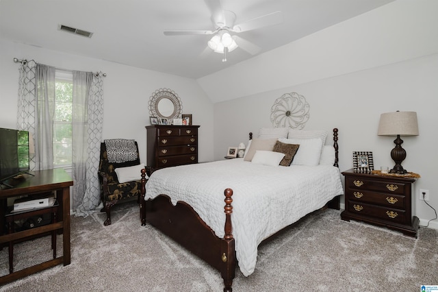 carpeted bedroom with lofted ceiling and ceiling fan