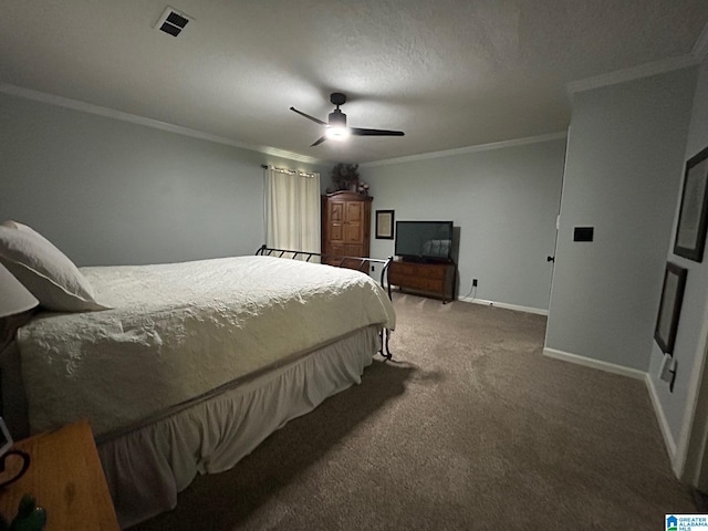 carpeted bedroom with ceiling fan, baseboards, crown molding, and visible vents
