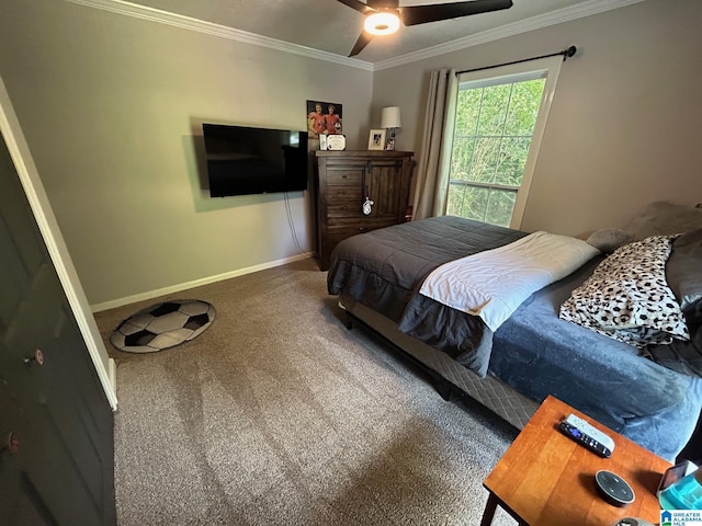 bedroom featuring ceiling fan, baseboards, crown molding, and carpet flooring