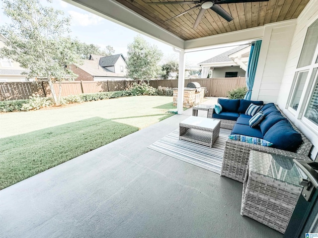 view of patio / terrace featuring ceiling fan