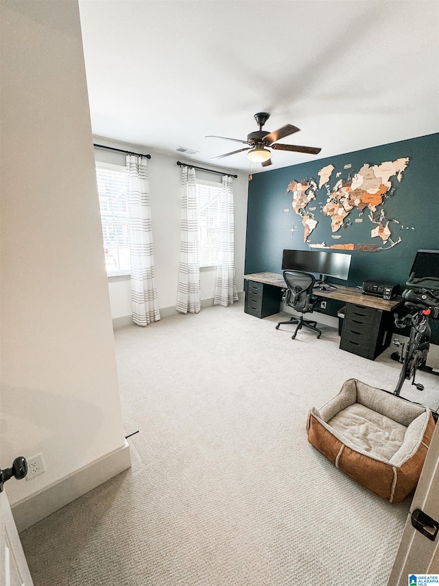 home office featuring carpet and ceiling fan