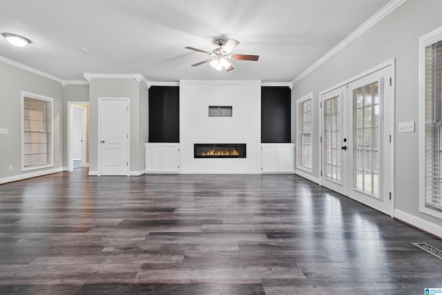 unfurnished living room with hardwood / wood-style flooring, crown molding, and ceiling fan