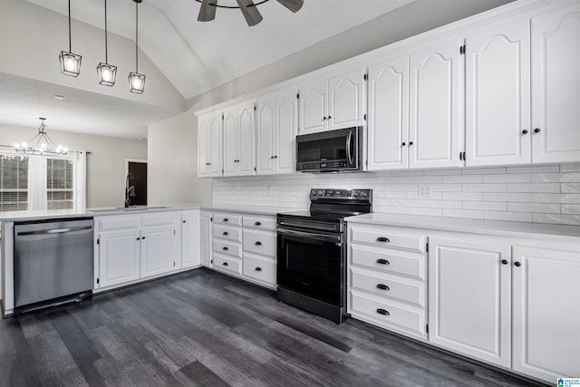 kitchen featuring stainless steel appliances, ceiling fan with notable chandelier, white cabinets, sink, and dark hardwood / wood-style floors