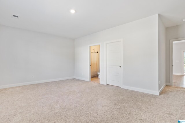 unfurnished living room featuring ceiling fan, crown molding, dark wood-type flooring, and a tiled fireplace