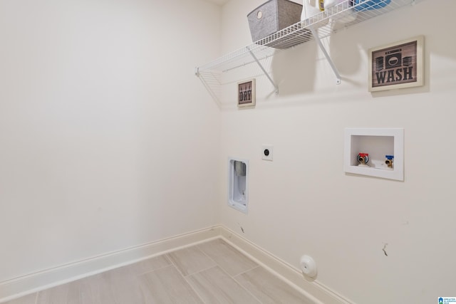 washroom featuring gas dryer hookup, washer hookup, and hookup for an electric dryer