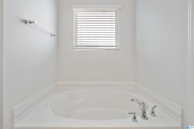 bathroom featuring a tub