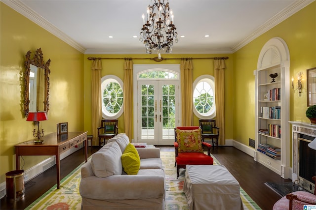 living room with ornamental molding, french doors, hardwood / wood-style floors, and plenty of natural light