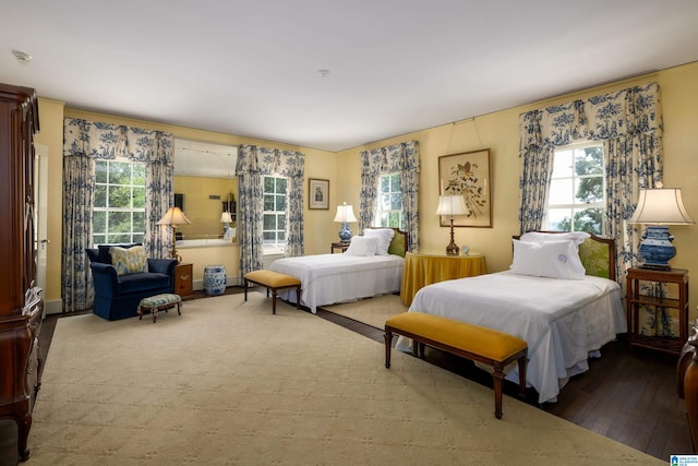 bedroom with hardwood / wood-style floors