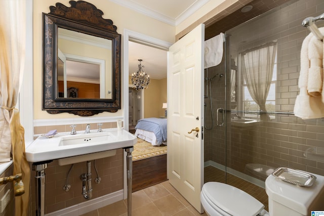 bathroom featuring a shower with shower door, sink, crown molding, toilet, and wood-type flooring