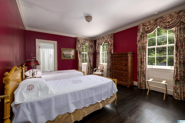 bedroom featuring hardwood / wood-style flooring and ornamental molding