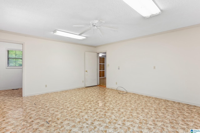 empty room featuring crown molding, a textured ceiling, and ceiling fan