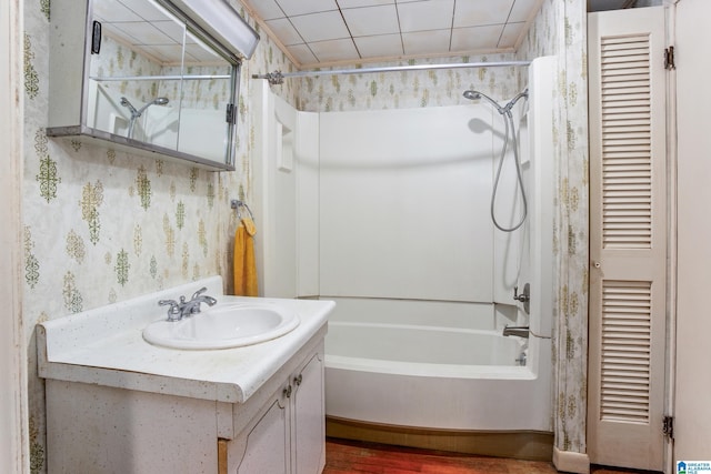 bathroom featuring vanity and shower / tub combination