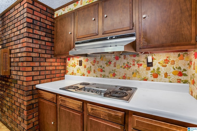 kitchen featuring tasteful backsplash and stainless steel gas stovetop