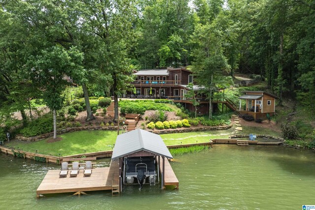 view of dock featuring a deck with water view