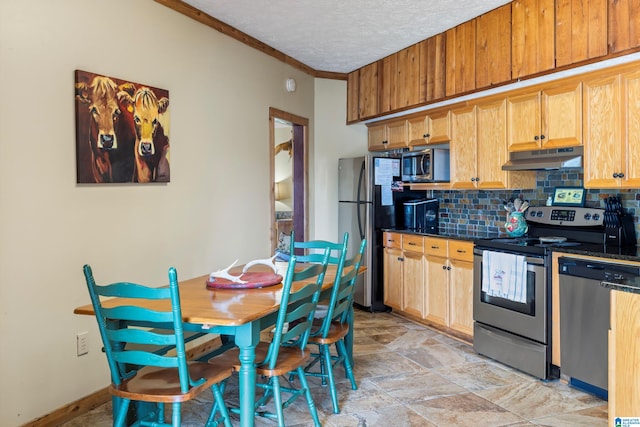 kitchen featuring backsplash, stainless steel appliances, ornamental molding, light tile patterned floors, and light brown cabinetry