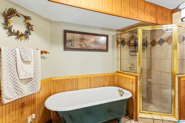 bathroom with a textured ceiling and plus walk in shower