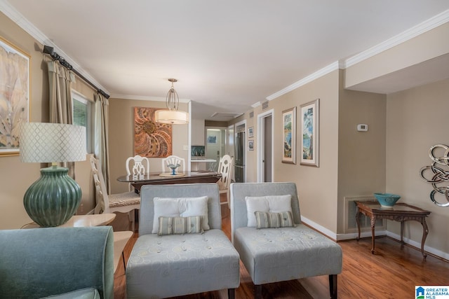 interior space with ornamental molding and hardwood / wood-style floors