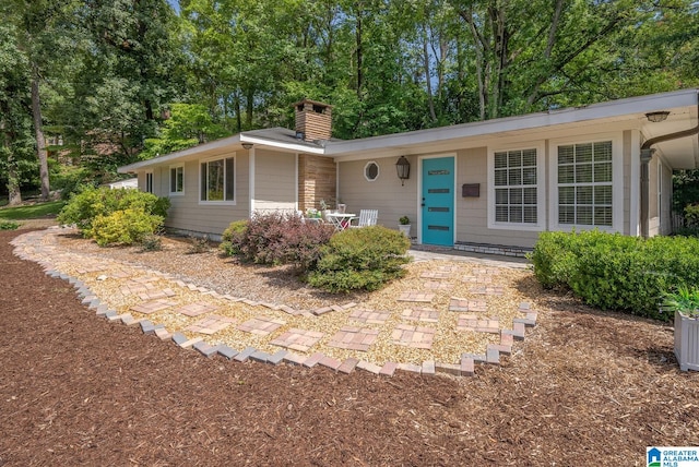 single story home featuring a patio