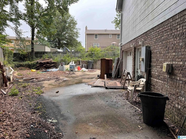 view of patio / terrace with a garage