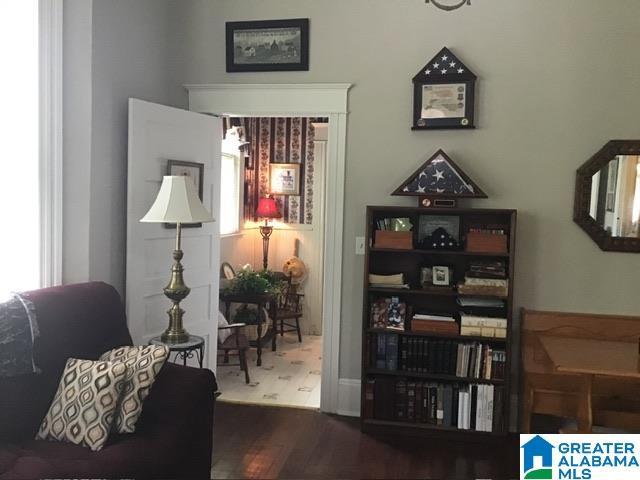 living area featuring hardwood / wood-style floors