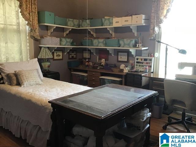 bedroom featuring hardwood / wood-style flooring