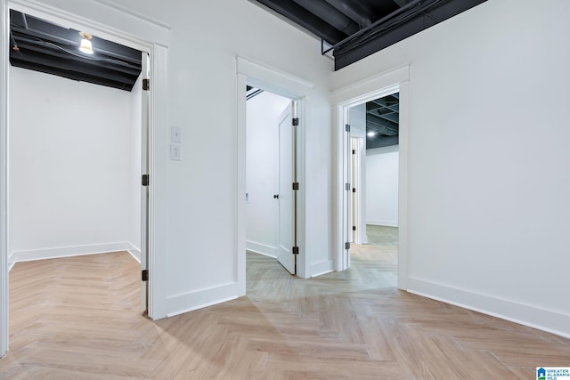 hallway featuring light parquet floors