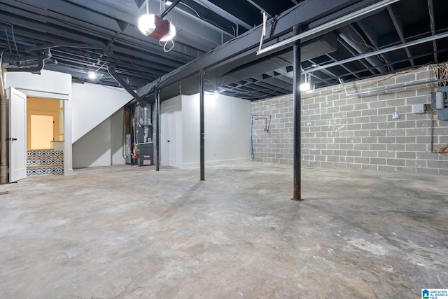 basement featuring heating unit