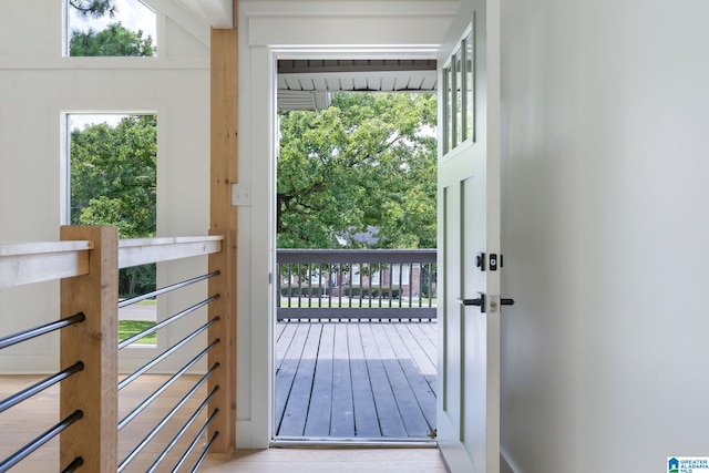 doorway with light wood-type flooring