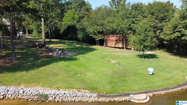 view of yard with a water view