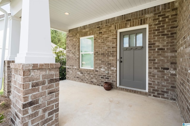 property entrance with a porch