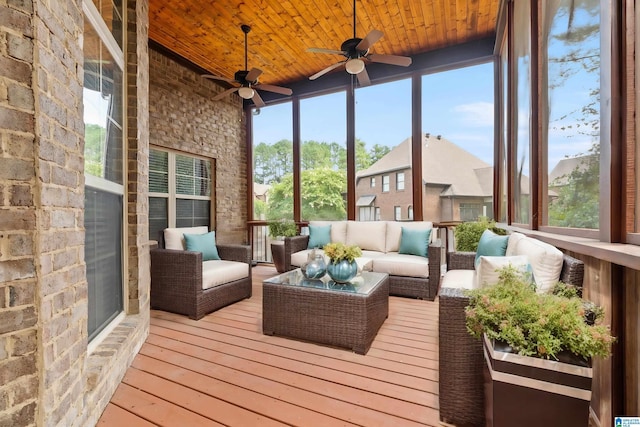 unfurnished sunroom with wood ceiling