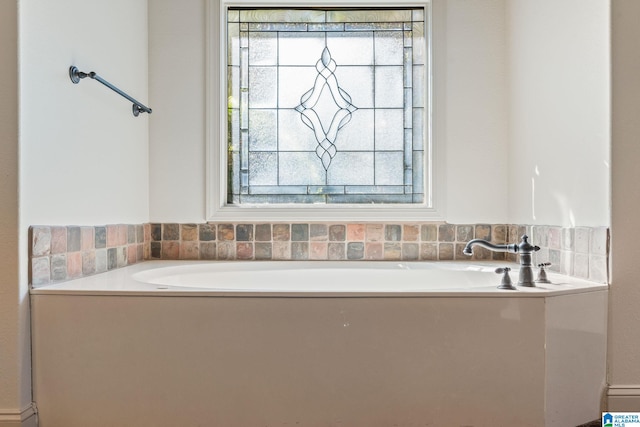 bathroom with a tub