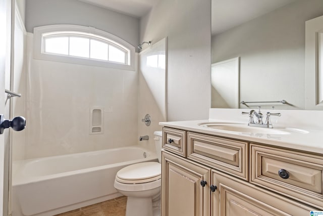 full bathroom with vanity, toilet, tile patterned floors, and tub / shower combination