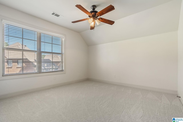 bonus room featuring ceiling fan, lofted ceiling, and carpet floors