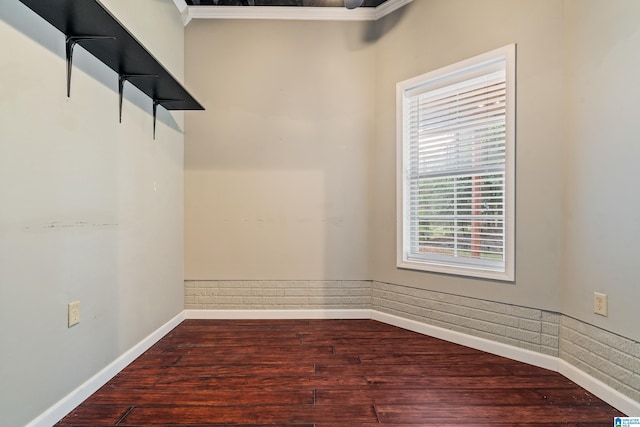 unfurnished room featuring hardwood / wood-style flooring