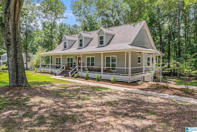 view of front facade featuring a porch and a shingled roof