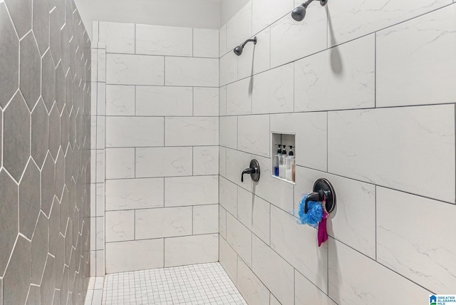 bathroom featuring tiled shower