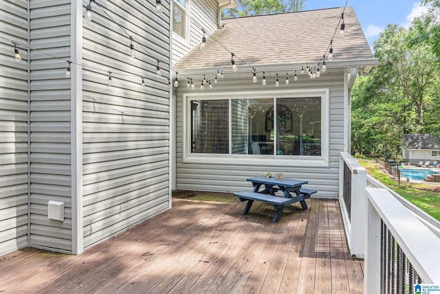 deck featuring outdoor dining area