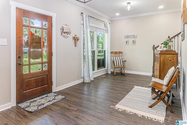 entryway with ornamental molding, dark wood-style flooring, recessed lighting, and baseboards