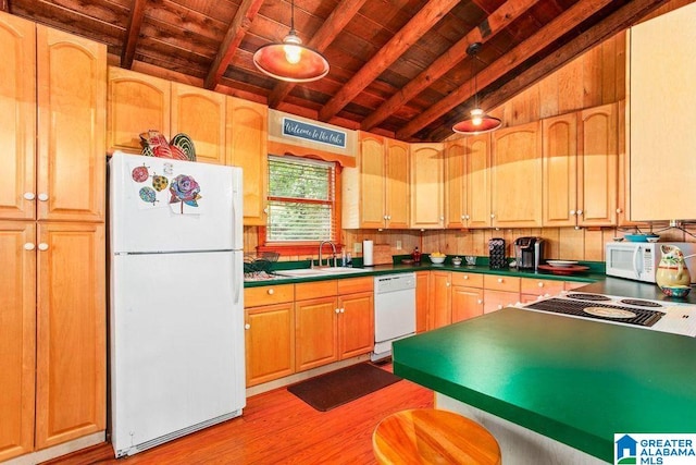 kitchen featuring vaulted ceiling with beams, white appliances, a sink, and wood ceiling