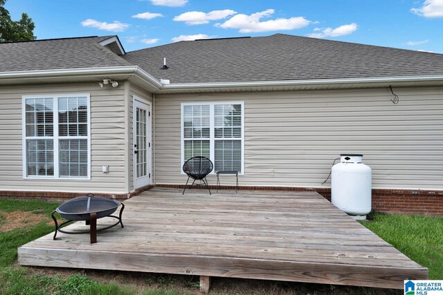 deck with an outdoor fire pit