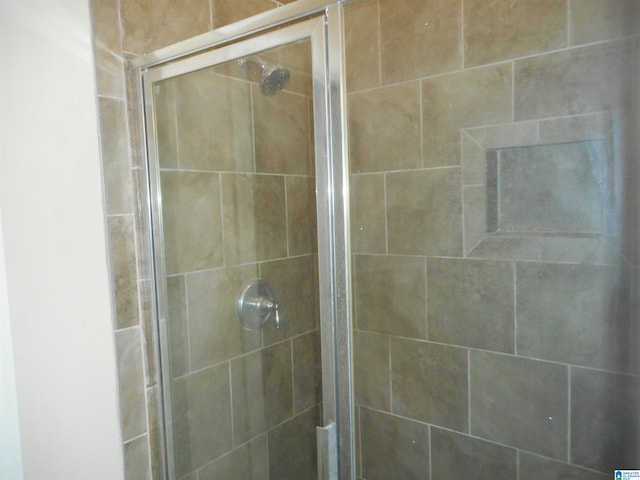 bathroom with an enclosed shower