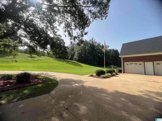 view of yard with a garage