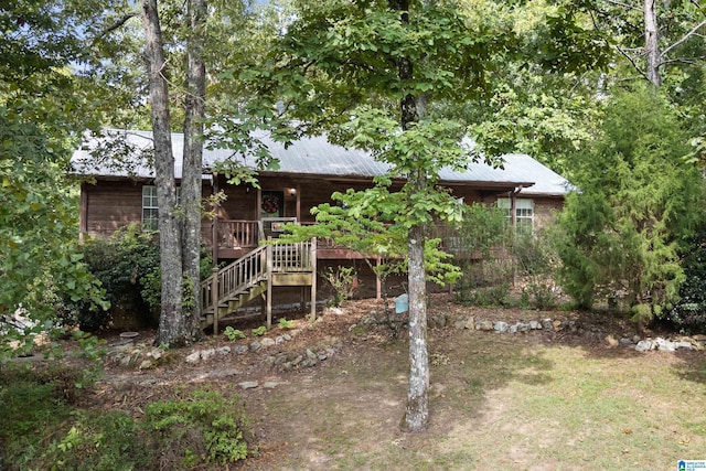 view of front of property with a deck